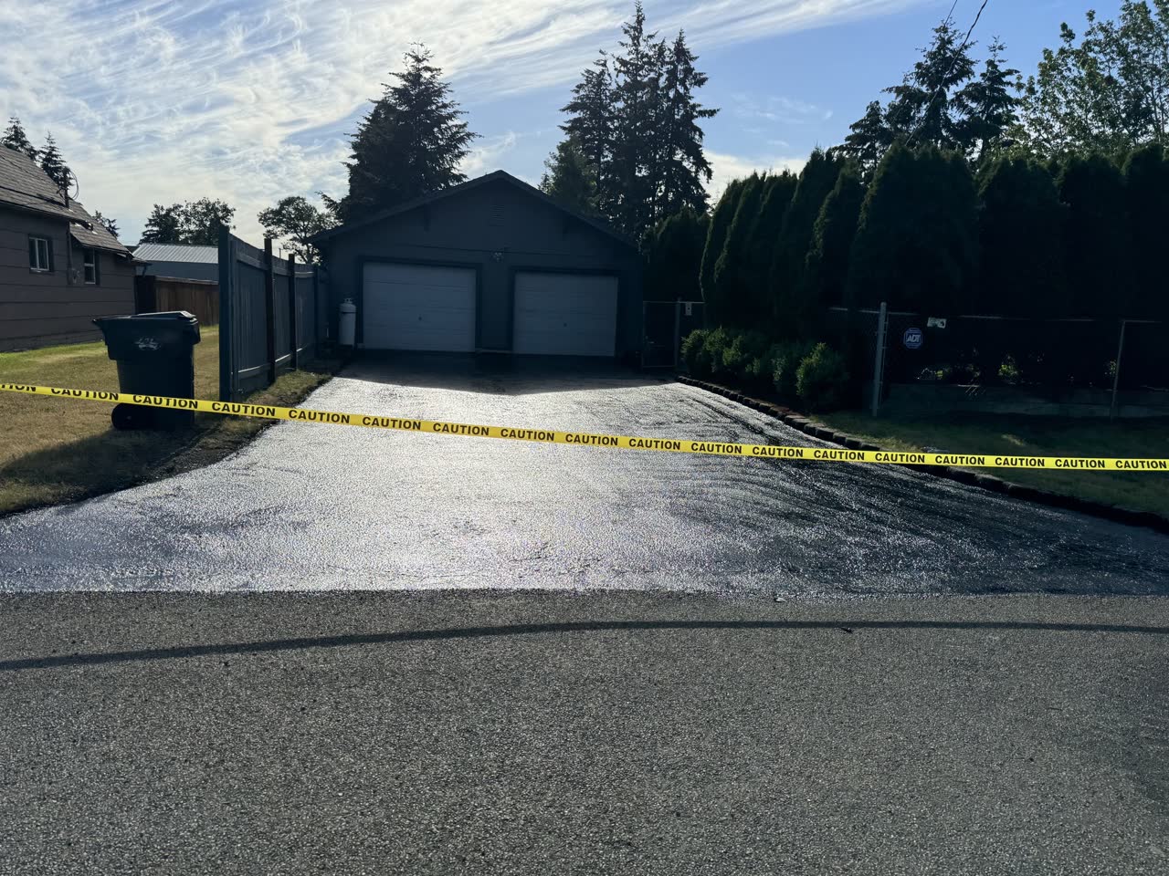 Asphalt resurfacing overlay on an existing surface